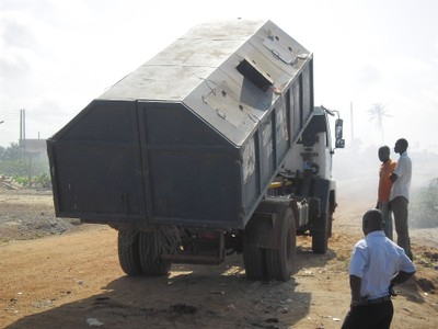 collection and disposing of refuse along major road.jpg