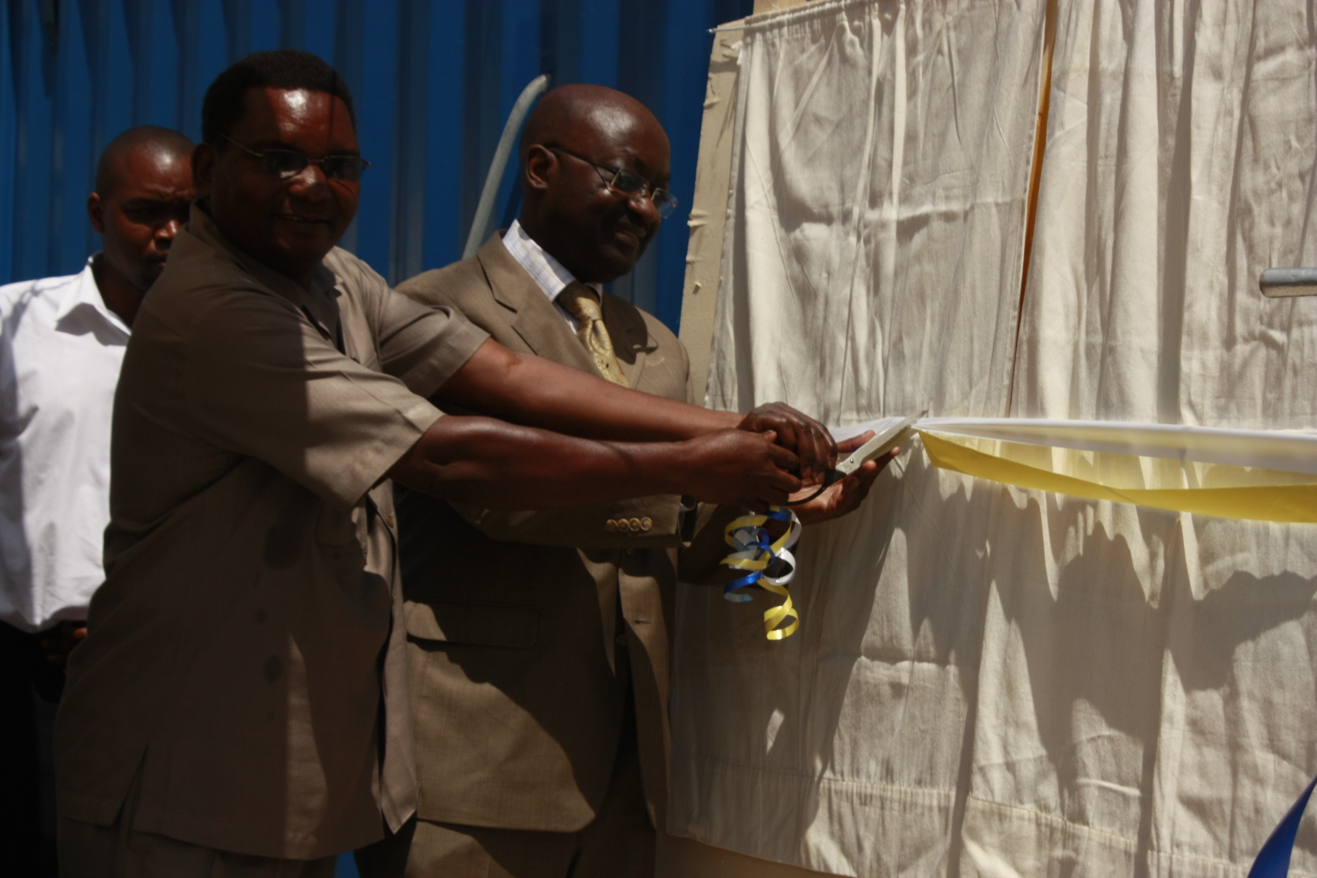 10. Formally unveiling the plaque to launch the water project.JPG