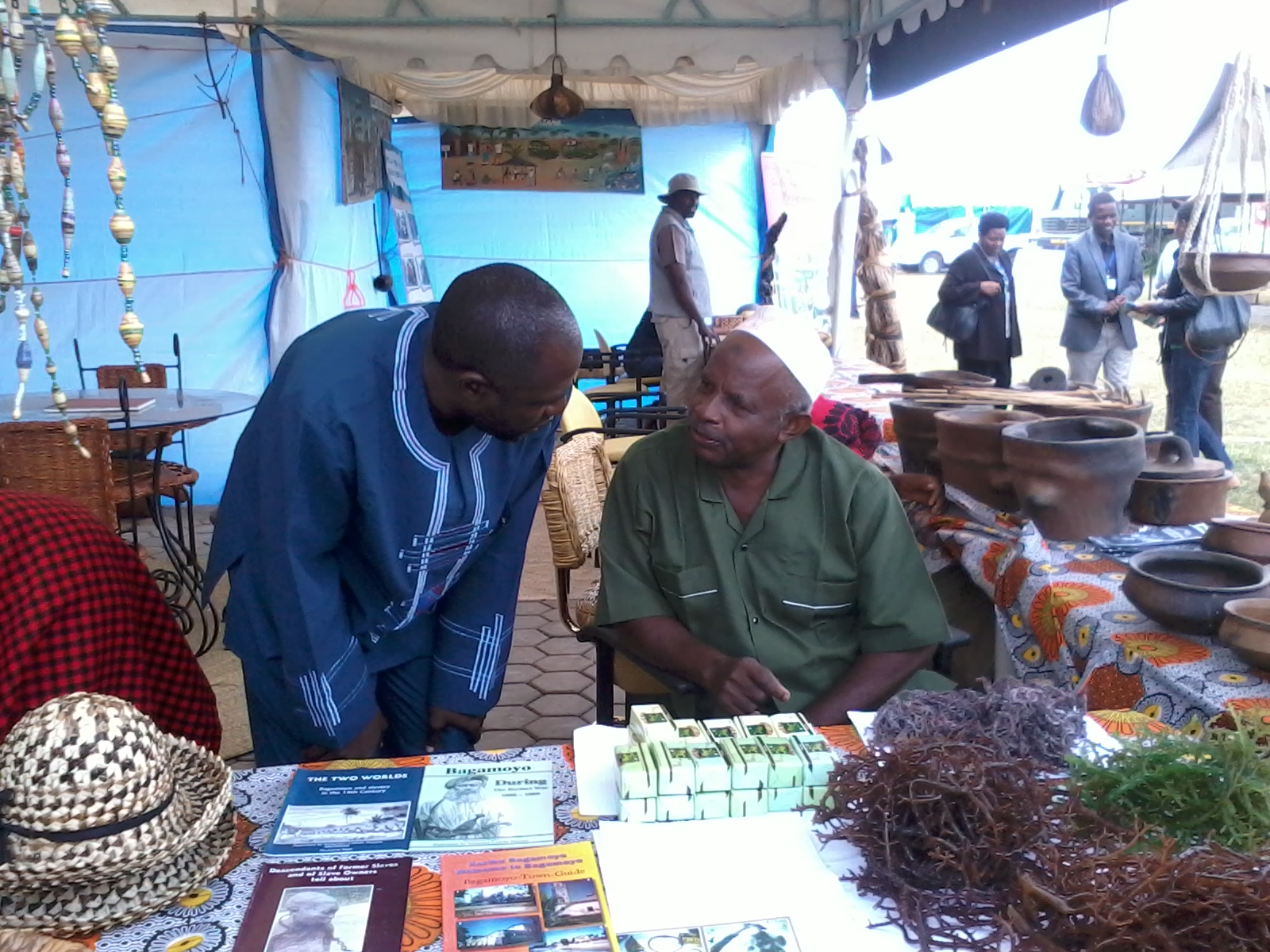 Seaweed and its soap with books,business cards and fliers promoting tourism in bagamoyo.jpg